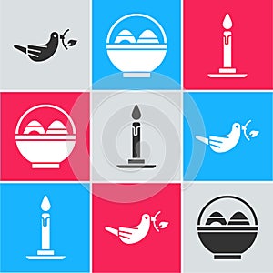 Set Peace dove with olive branch, Basket with easter eggs and Burning candle in candlestick icon. Vector