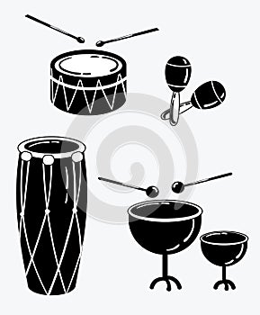 A set of percussion musical instruments. Collection of musical drums. Stylized musical instruments. Black and white