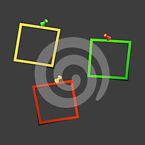 Set of photoframes with color pins on a black background