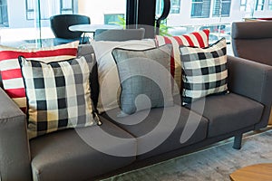 Set of pillows on luxuty sofa in living room, interior design