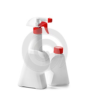 A set of plastic bottles with detergents and cleaners on a white background, household chemicals in packages