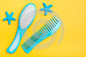 A set of plastic combs and two hairpins