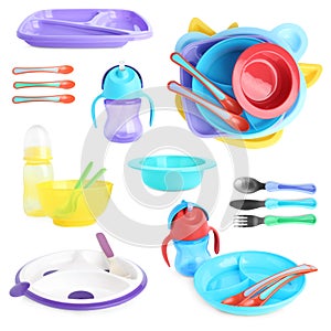 Set of plastic dishware for baby food on background