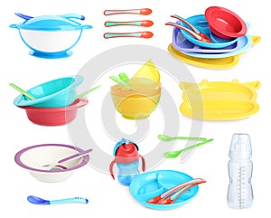 Set of plastic dishware for baby food on background