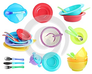 Set of plastic dishware for baby food on background