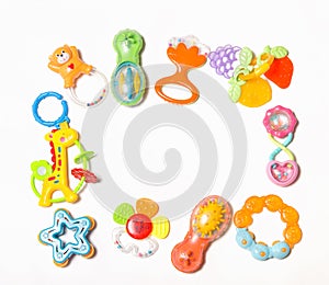 Set of plastic toys for newborn isolated on white