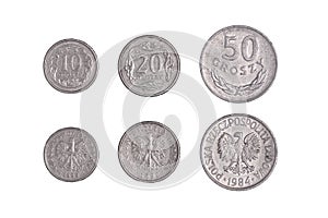 set of Polish coins, 10 20 50 groszy on a black background. close-up