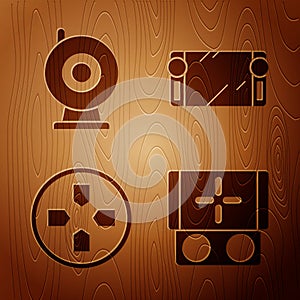 Set Portable video game console, Web camera, Gamepad and Portable video game console on wooden background. Vector