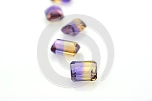 Set of precious purple and yellow polished gems of ametrine. Jewelry and precious stones photo