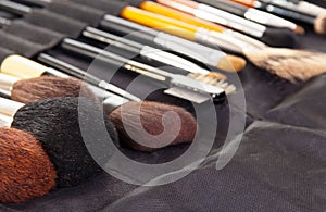 Set professional cosmetic brushes for make-up background.