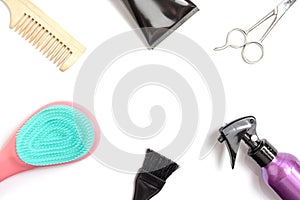 Set of professional hairdresser tools equipment on white background - scissors, comb, brush and spray - hair stylist concept with