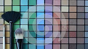 Set of professional make-up brushes with the Pallette of shadows