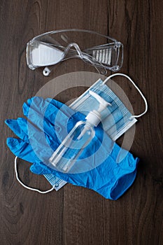 Set of protective eqipment agains corona covid viruses - chirurgical mask, gloves and glasses