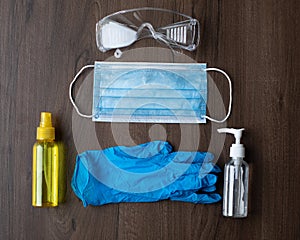 Set of protective eqipment agains corona covid viruses - chirurgical mask, gloves and glasses photo