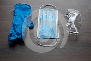 Set of protective eqipment agains viruses - chirurgical mask, gloves and glasses