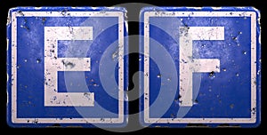 Set of public road sign in blue color with a capital white letters E and F in the center isolated of black background