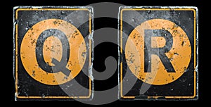 Set of public road sign orange and black color with a capital letters Q and R in the center isolated on black background