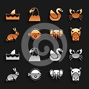 Set Puffer fish, Crab, Hippo or Hippopotamus, Elephant, Rabbit, Swan bird, Shark fin in ocean wave and Eagle head icon