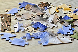 A set of puzzles on wooden floor