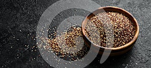 Set of quinoa Red, white and brown quinoa. On a black background.