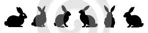 Set of Rabbit silhouettes. Easter bunnies. Isolated on white backdrop. A simple black icons of hares. Cute animals