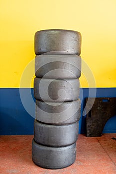Set of racing car slick tyres pile