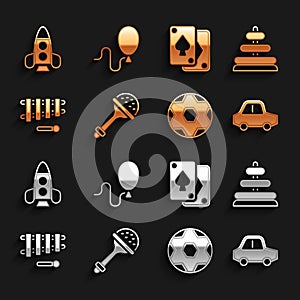 Set Rattle baby toy, Pyramid, Toy car, Soccer football ball, Xylophone, Playing cards, Rocket ship and Balloons icon