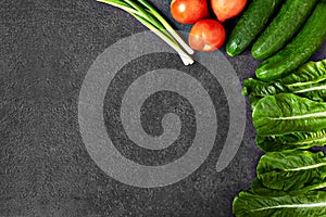 Set of Raw organic food, vegetables with fresh ingredients for healthily cooking on black  background, top view, banner. Vegan or