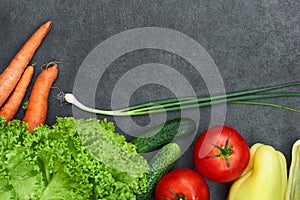 Set of Raw organic vegetables with fresh ingredients for healthily cooking on black  background, top view, banner.