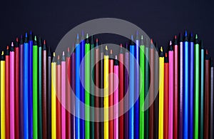 Set of Realistic Colorful Colored Pencils on the black background