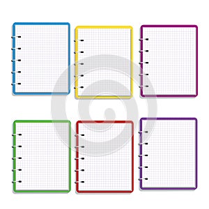 Set of realistic colorful spiral notebook with square grid blank pages isolated on white background. Notepad on desk. Design eleme