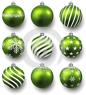 Set of realistic green christmas balls.