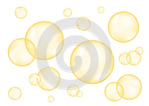 Set of realistic transparent glossy gold bubbles.