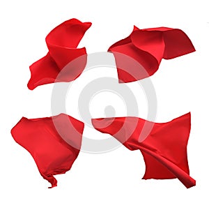 Set of red cloth in flight on a white