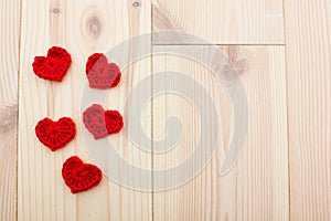 Set of red knitted hearts