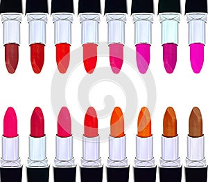 Set of red lipsticks isolated on white reflective