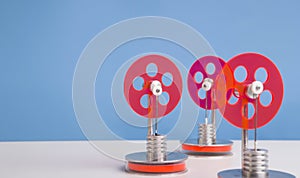 Set of red plastic gears for energy producing