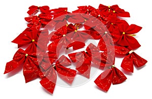 Set of red ribbon bows on white