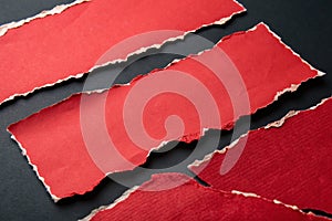 Set of red torn sharp ripped paper edges photo