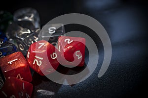 A set of red and transparent RPG dice photo