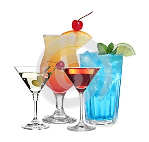 Set of refreshing alcoholic drinks on background