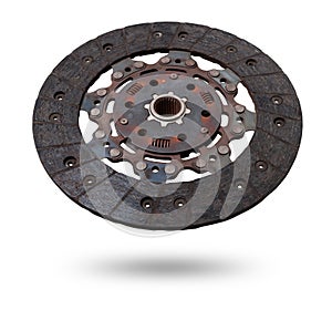 Set of replacement automotive clutch isolated on white background. Disc and clutch basket with release bearing