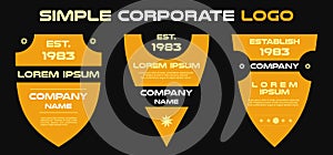 Set retro corporate simple vector logo template, traingle shield shape in gold color on black background photo