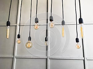 Set of retro incandescent lamps on a blue wall background