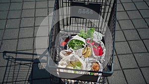 Set of reusable and zero waste cotton shopping bags for food in cart