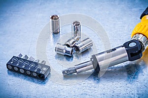 Set of reversive turnscrew screwdriver bits and