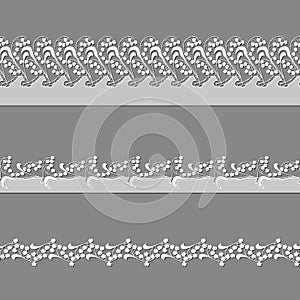 Set of ribbons embroidered cutwork