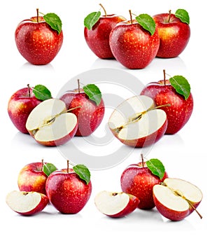 Set of ripe red apples with green leaves isolated