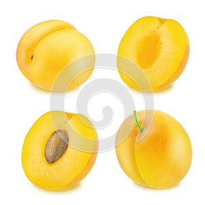 Set of ripe yellow plums isolated