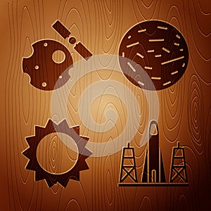 Set Rocket launch from the spaceport, Satellites orbiting the planet Earth, Sun and Planet Venus on wooden background